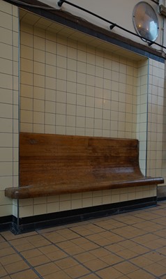 In-situ timber seating in tiled recess.