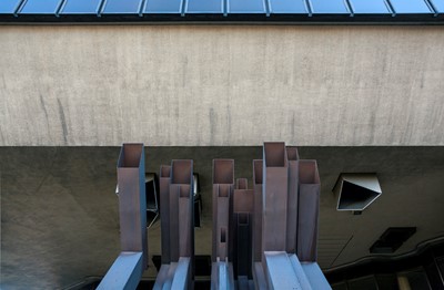 Modernist organ pipes double as ventilation outlets.