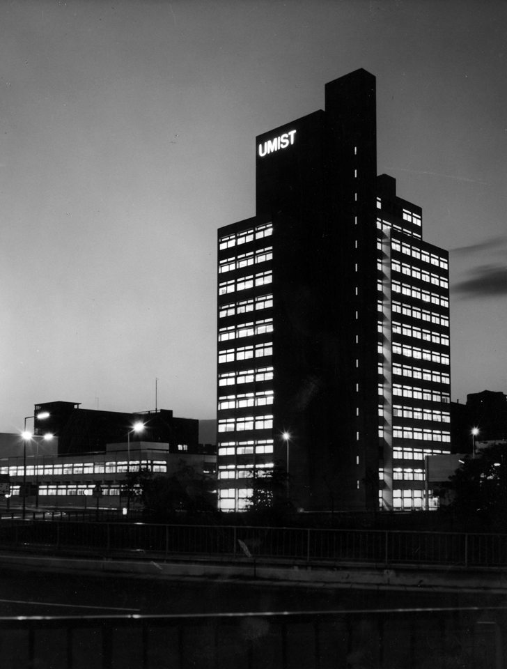 UMIST sign glows at head of tower.