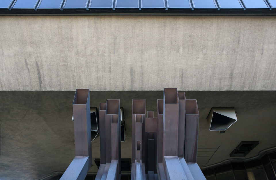 Modernist organ pipes double as ventilation outlets.